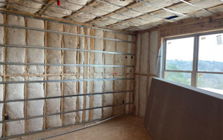 Exterior and Corridor Wall Insulation in Multifamily Housing