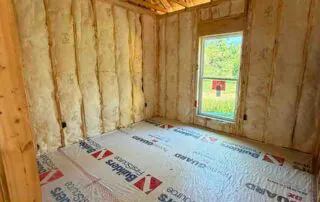 Johns Manville R19 wall batt insulation installed in a corner room in a new construction America's Home Place home in Adairsville, GA.
