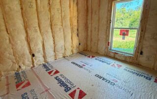Johns Manville R19 wall batt insulation installed in a corner room in a new construction America's Home Place home in Adairsville, GA.
