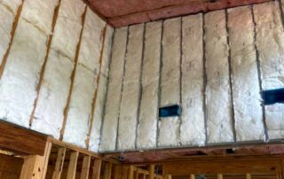Foster Insulation fiberglass batt insulation installed in walls and ceiling.